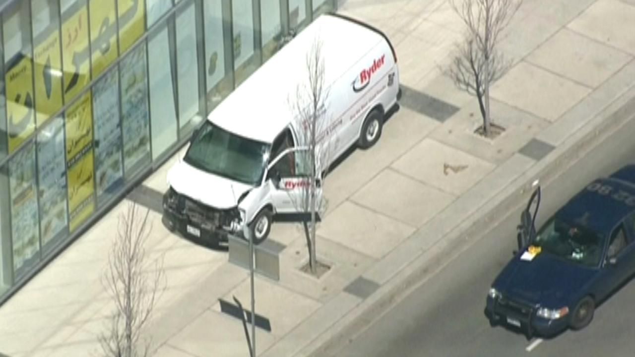 Van plows into crowd in Toronto, injuring several, driver in custody, cops say